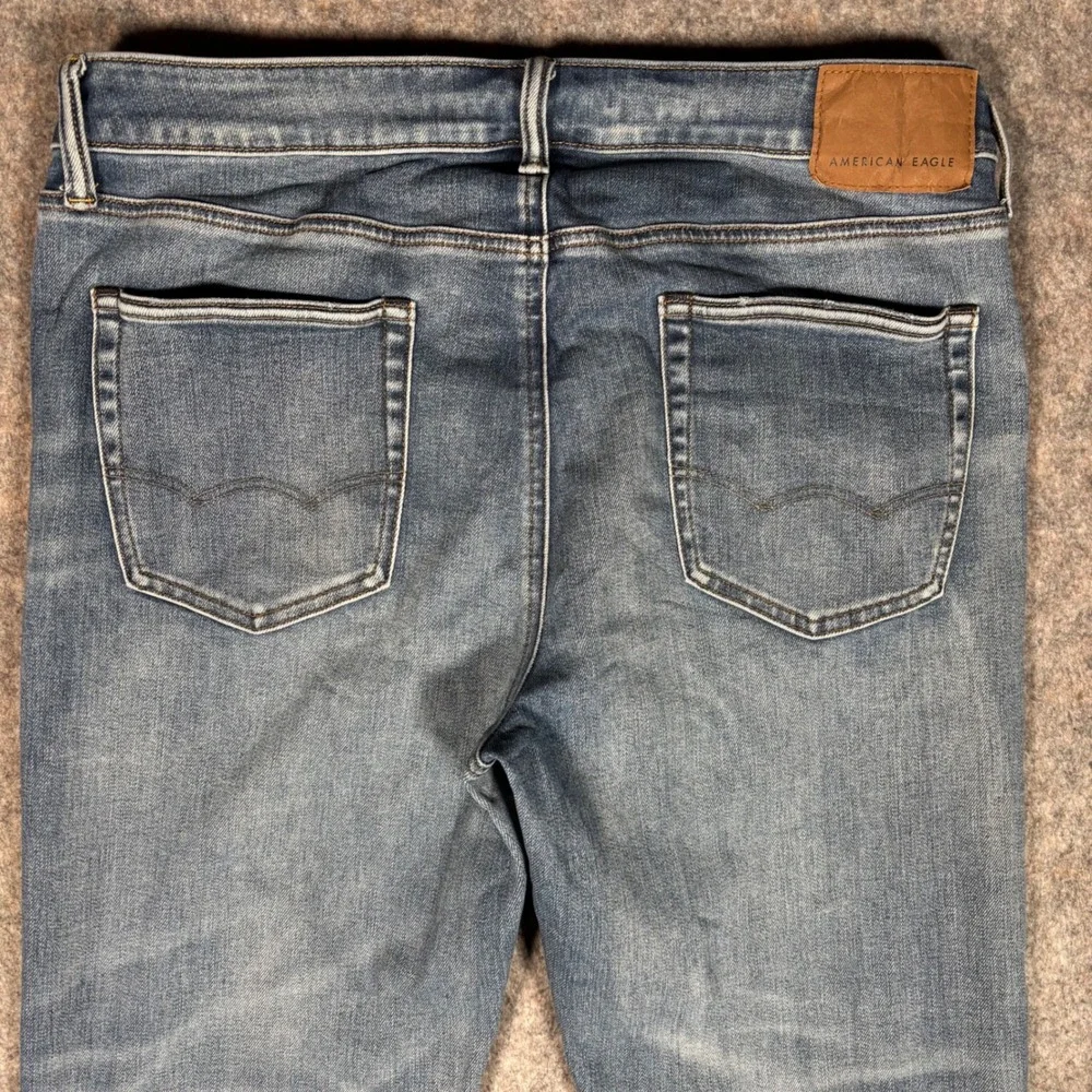American Eagle Airflex+ Slim Jeans Mens 34x32 (35x31) Medium Blue Faded Whiskers